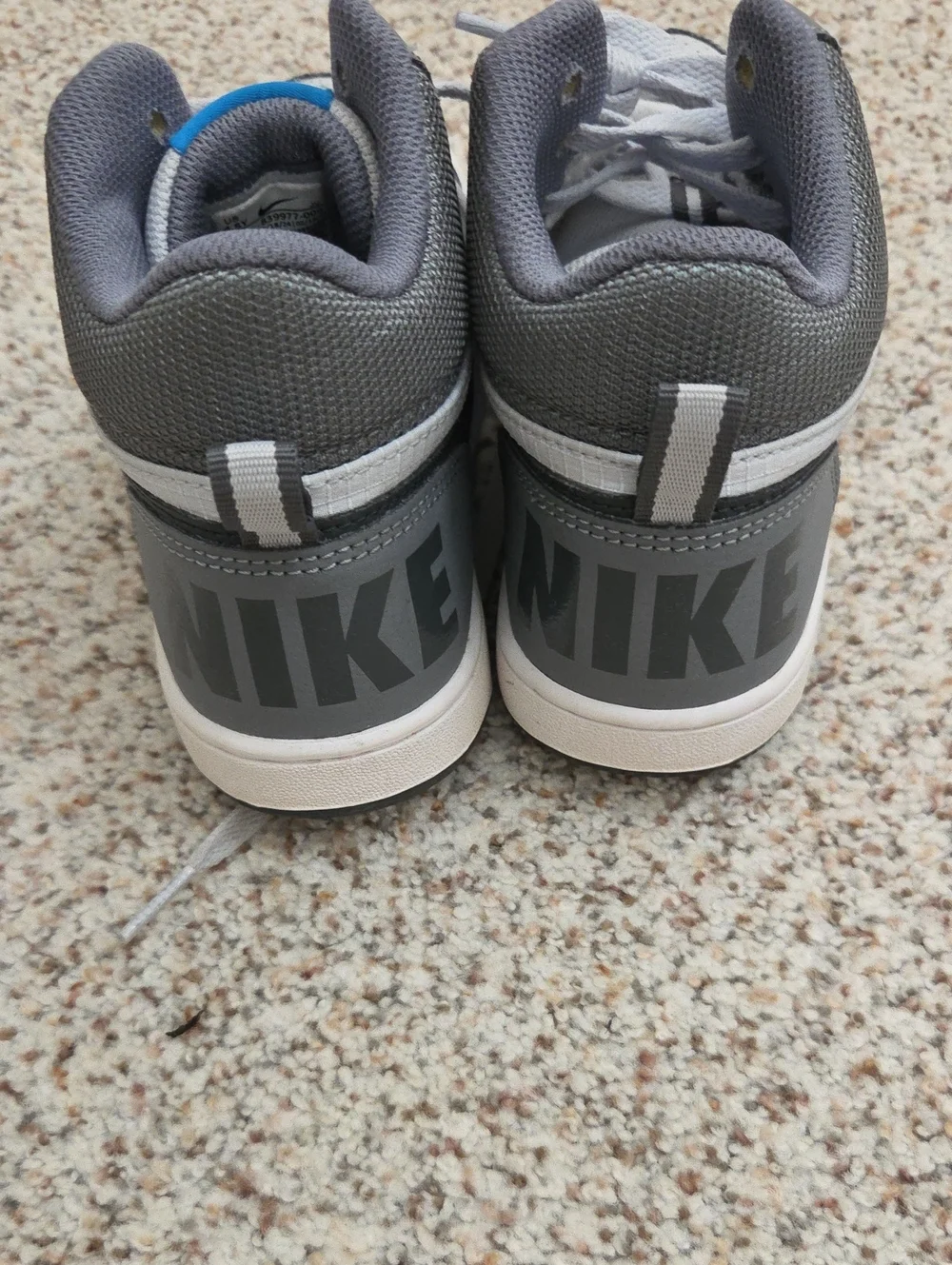 Nike Kids Gray and White High-Top Sneakers with Black Swoosh